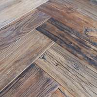 Reclaimed herringbone hardwood parquet flooring